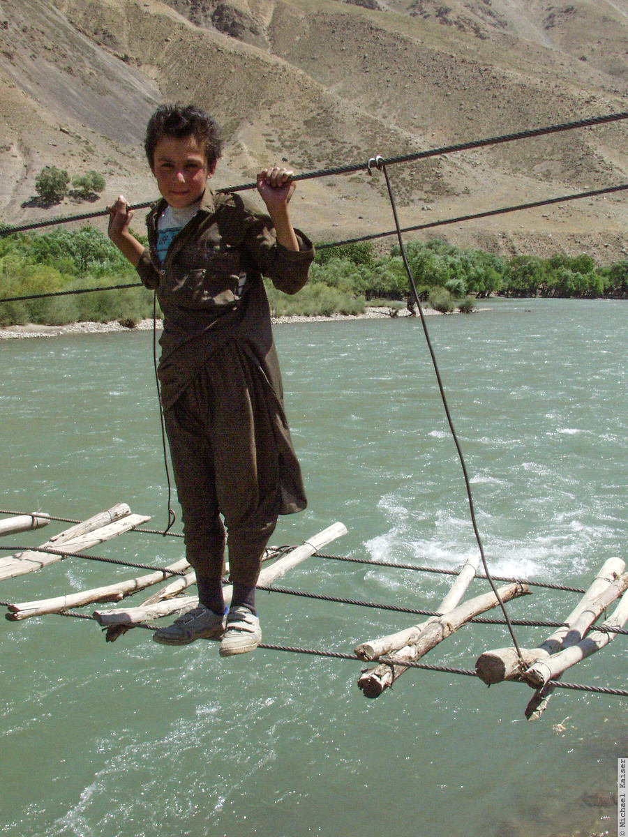 Boy on bridge